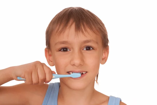 Хлопчик чищення зубів — стокове фото