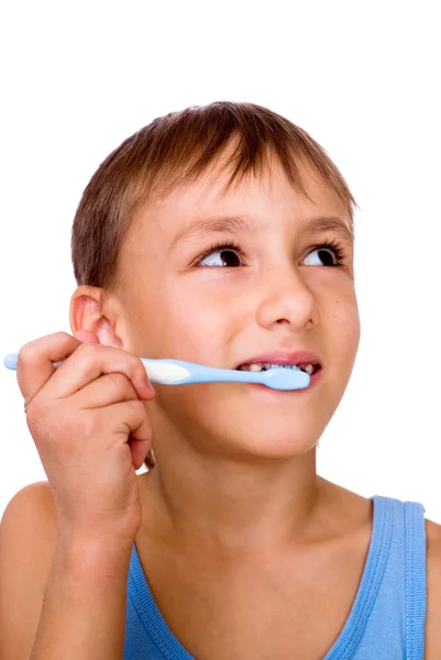 Rapaz bonito a escovar os dentes — Fotografia de Stock