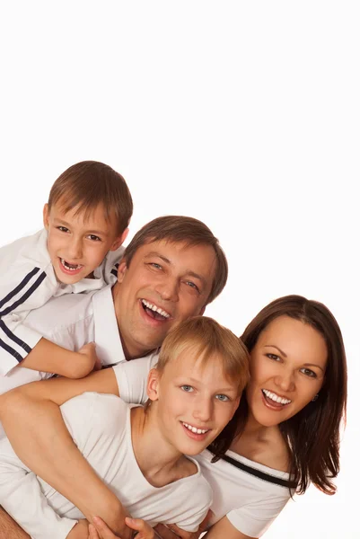 Hermosa familia feliz de cuatro — Foto de Stock