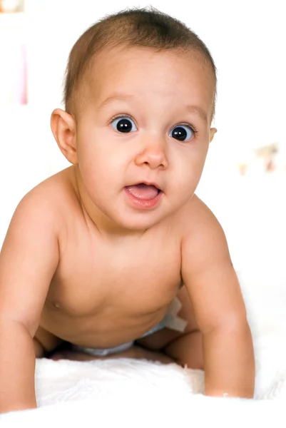 Niza feliz recién nacido en un blanco —  Fotos de Stock