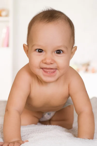 Niza feliz recién nacido en un blanco — Foto de Stock