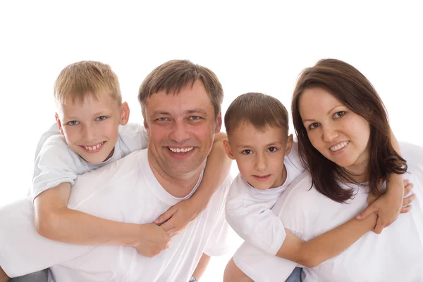 Porträt einer glücklichen Familie auf weißem Grund — Stockfoto