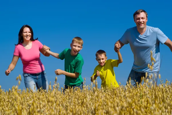 Happy family on the nature Stock Image