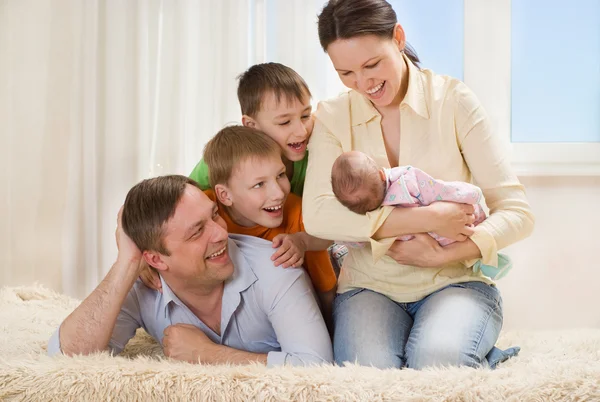 Happy parents of children together — Stock Photo, Image