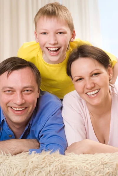 Família feliz três — Fotografia de Stock
