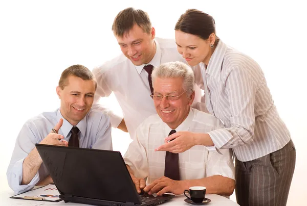 Cuatro hombres de negocios trabajando — Foto de Stock