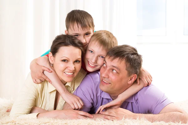 Parents with their two children Stock Photo