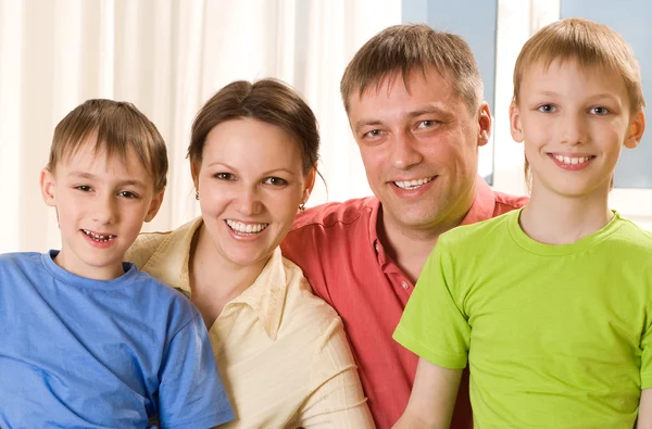 Parents with their two children Stock Image