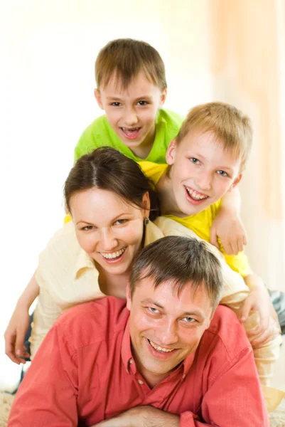 Happy family playing Stock Photo