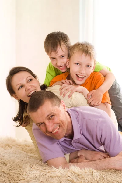 Parents with their two children Stock Photo