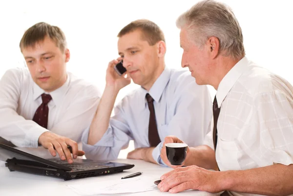 Businessmen working on a white background — Stock Photo, Image