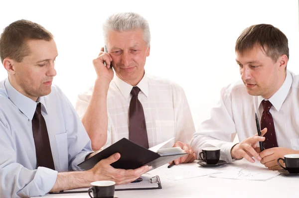 Three businessmen working together — Stock Photo, Image