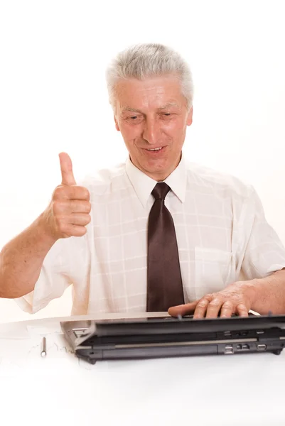 Homme d'affaires d'âge moyen avec ordinateur portable — Photo