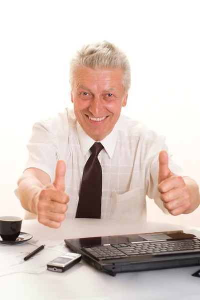 Бізнесмен середнього віку з ноутбуком — стокове фото