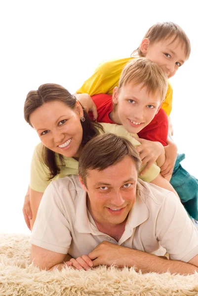 Family on the carpet — Stock Photo, Image