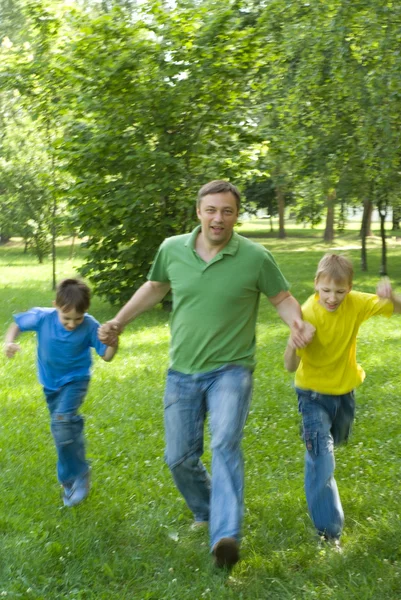 Father playing with children — Stock Photo, Image