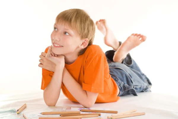 Boy lying and draw — Stock Photo, Image