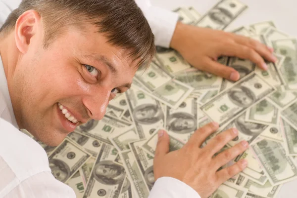 Молодий чоловік тримає гроші — стокове фото
