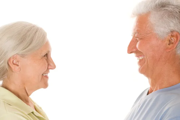 Äldre par på en vit — Stockfoto