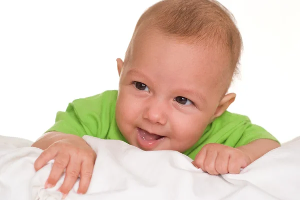 Portrait of a beautiful baby in green — Stock Photo, Image