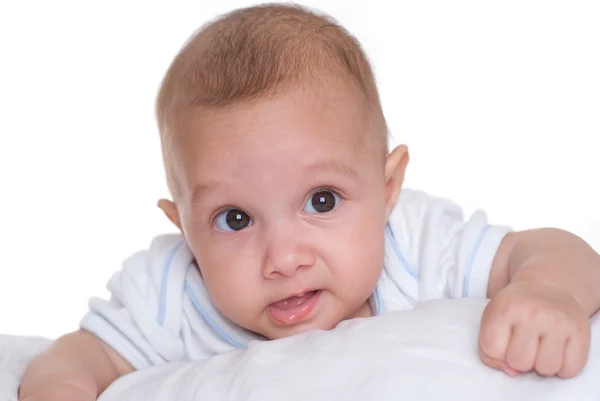 Baby auf einem weißen — Stockfoto