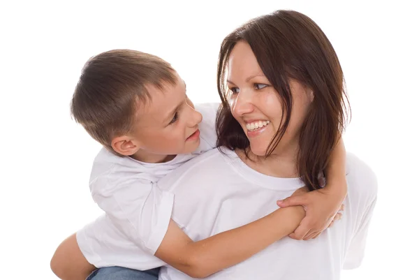 Mor med sitt barn på en vit — Stockfoto