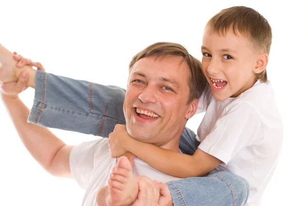 Pai e filho felizes em um branco — Fotografia de Stock