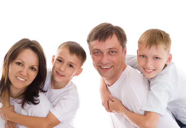 Retrato de família feliz em um branco — Fotografia de Stock