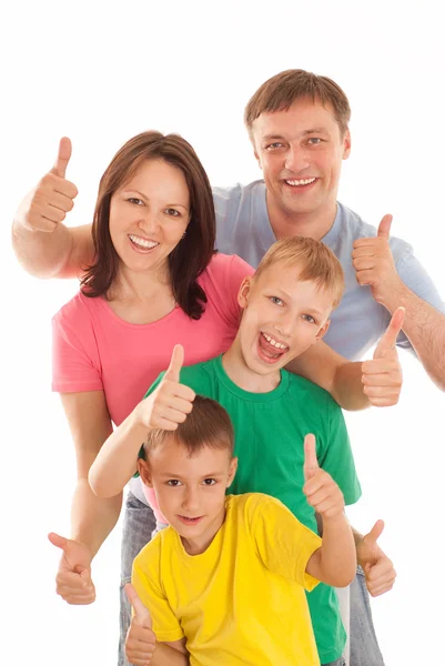 Glückliche Familie auf einem weißen — Stockfoto