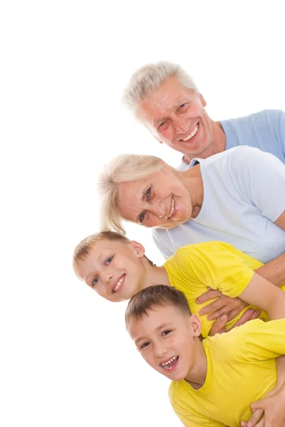 Familie van vier op een witte achtergrond — Stockfoto