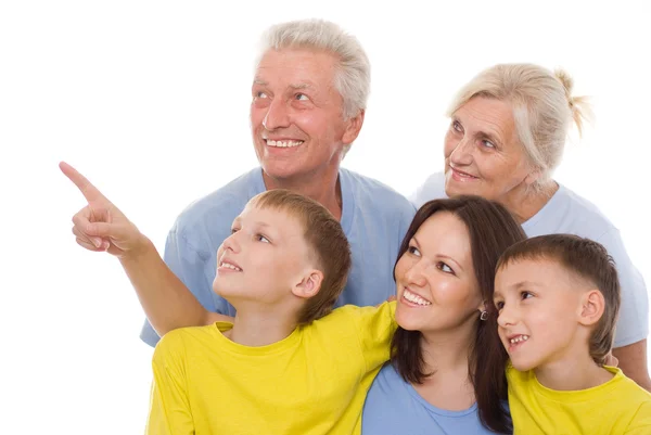Familia feliz sobre un fondo blanco — Foto de Stock