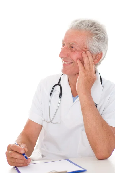 Zadowolony lekarz na białym — Zdjęcie stockowe