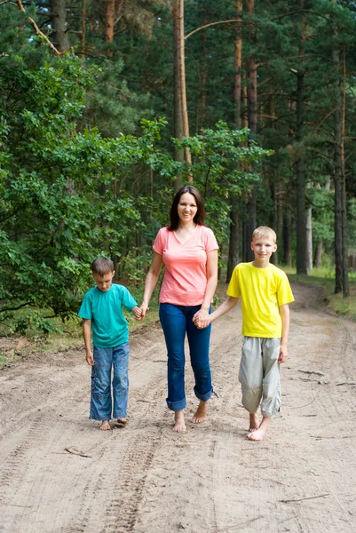 Family in the forest — Stock Photo, Image