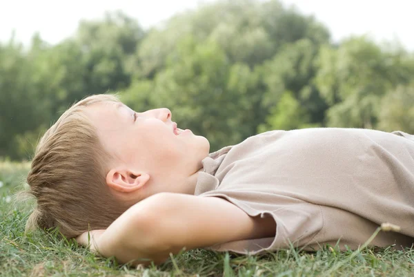 Beautiful boy in the park — Stock Photo, Image