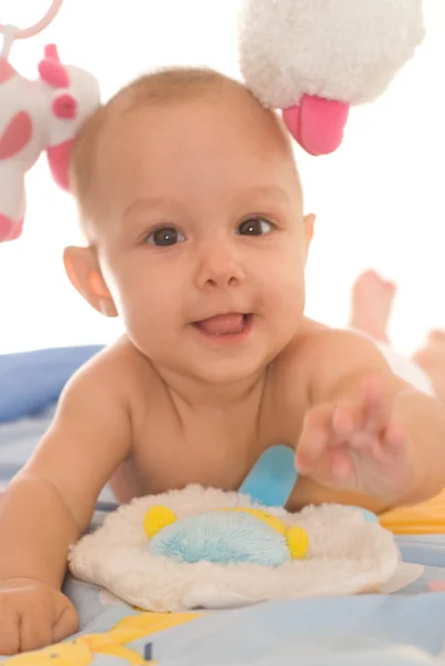 Bebê feliz em um branco — Fotografia de Stock
