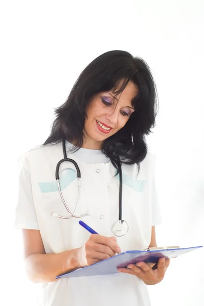 Kvinna läkare på en vit — Stockfoto
