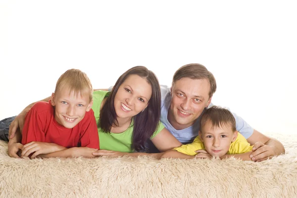 Familia feliz de cuatro — Foto de Stock