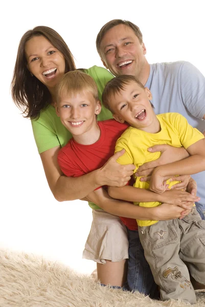 Szczęśliwa rodzina na światło — Zdjęcie stockowe