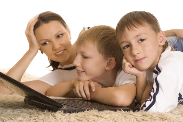 Mom with sons is on the carpet — Stock Photo, Image