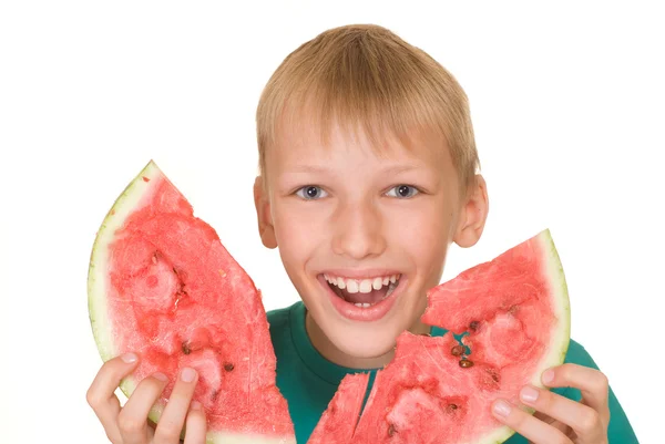 Pojke som äter vattenmelon — Stockfoto