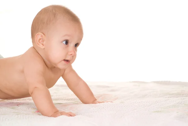 Nettes Baby auf einem weißen — Stockfoto