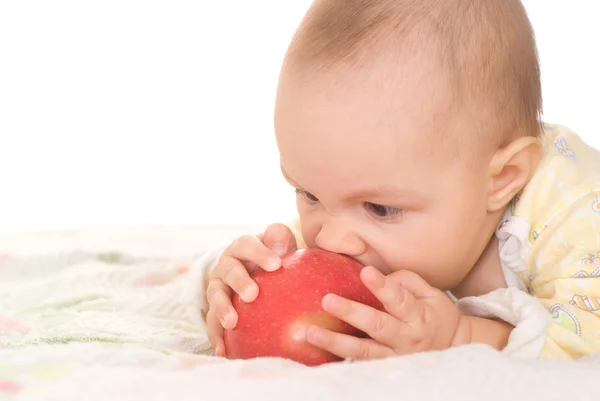 Bel bambino e mela su un bianco — Foto Stock