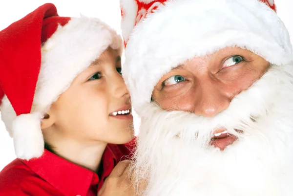Санта с ребенком на белом — стоковое фото