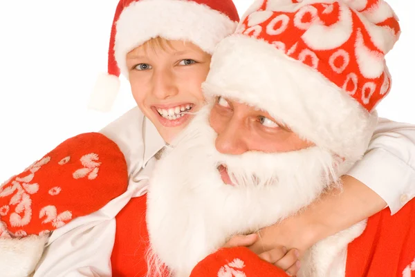 Weihnachtsmann mit Kind auf einem weißen — Stockfoto