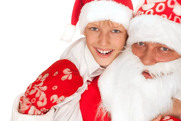 Weihnachtsmann mit Kind auf einem weißen — Stockfoto