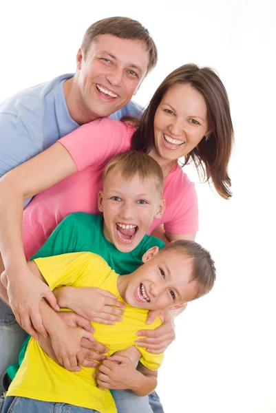 Счастливая семья из четырех человек Стоковое Фото