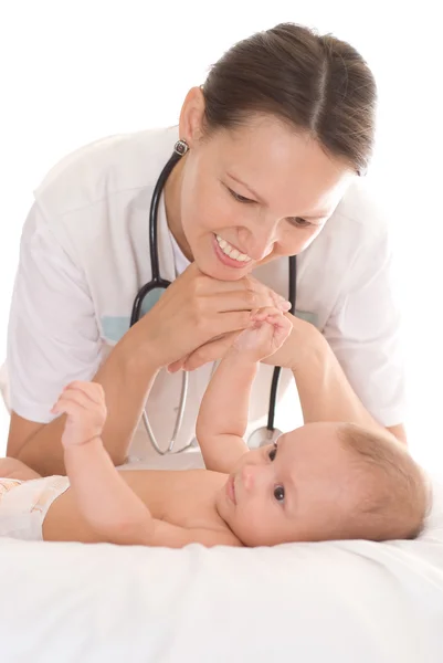 Doctor with newborn child Stock Picture