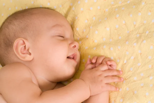 Feliz bebé durmiendo Imágenes de stock libres de derechos