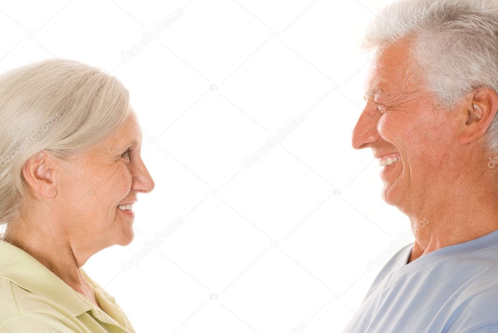 Elderly couple on a white