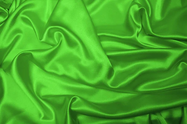 Чувственный гладкий зеленый сатин — стоковое фото